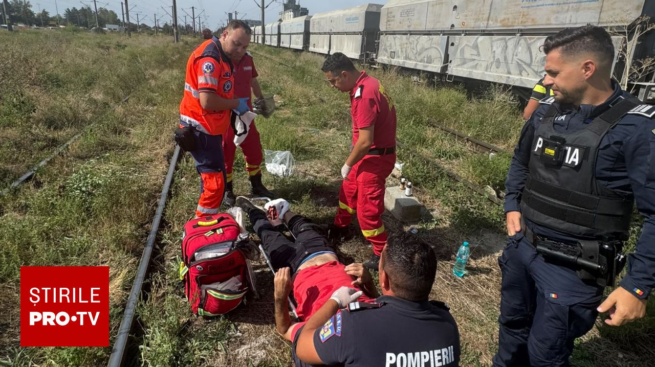 Un agent de pază a suferit răni gravi după ce a încercat să urce într-un tren aflat în mișcare
